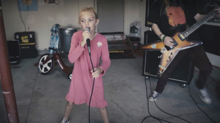 Watch 8-Year-Old Girl Cover Pantera's "Walk" With Kid Band