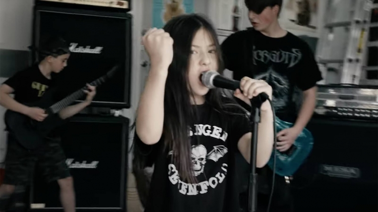 See 9-year-old girl totally crush PANTERA's "Domination" with kid band