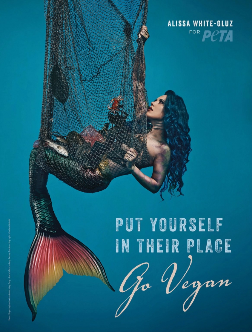 See ARCH ENEMY singer become trapped mermaid in new PETA ad