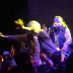 Municipal Waste mom stage-diving 