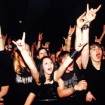 metal fans crowd mosh pit, PYMCA/UIG via Getty Images